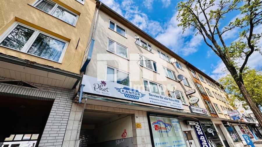 Modernisiertes Mehrfamilienhaus mit 8 Wohneinheiten und 2 Gewerbeflächen - Frontansicht Titel
